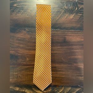 Men’s Orange and blue chaps tie. 58.5 inches long. 3.5 Inches Wide. Gently used